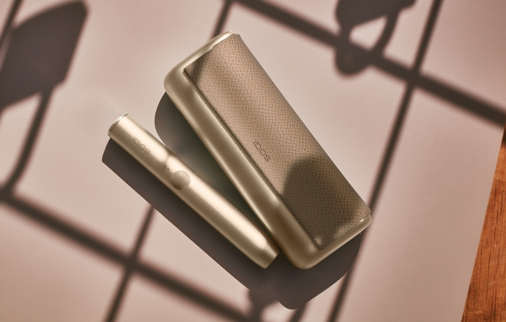An IQOS ILUMA PRIME Pocket Charger and Holder.